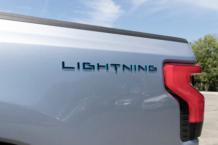Tipton - Circa July 2022: Ford F-150 Lightning display. Ford offers the F150 Lightning all-electric...