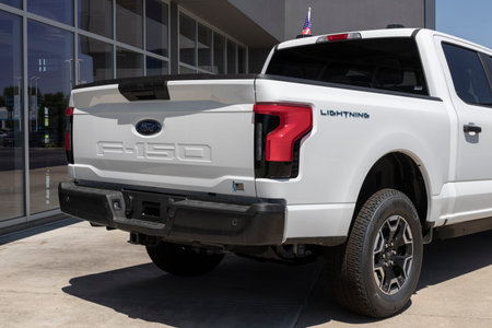 Plainfield - Circa July 2022: Ford F-150 Lightning display. Ford offers the F150 Lightning...
