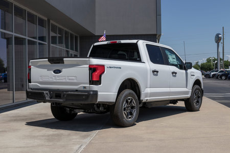 Plainfield - Circa July 2022: Ford F-150 Lightning display. Ford offers the F150 Lightning...