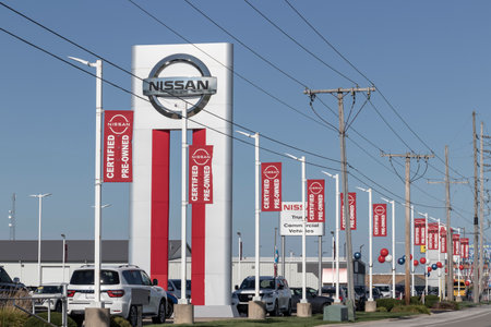 Merrillville - Circa July 2022: Nissan dealership offering certified, pre-owned cars and SUVs. With supply issues, Nissan is buying and selling many used cars to meet demand.のeditorial素材