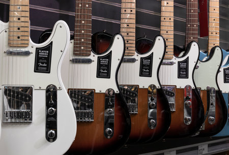 Muncie - Circa August 2022: Fender Telecaster guitar display at a music store. Teles are world renowned for their distinctive twangy sound.のeditorial素材