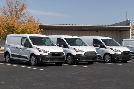 Plainfield - Circa October 2022: Ford Transit Connect display at a dealership. Ford offers the...