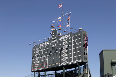 Chicago - Circa October 2022: Chicago Cubs center field scoreboard on the northeast corner of Wrigley field. Wrigley Field has been home to the Cubs since 1916.のeditorial素材
