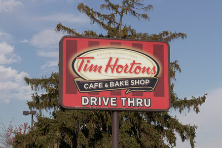 Troy - Circa October 2022: Tim Hortons Cafe & Bake Shop. This is the US version of the popular Canadian fast casual restaurant.のeditorial素材
