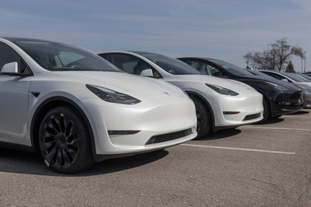 Indianapolis - Circa March 2023: Tesla EV electric vehicles on display. Tesla products include electric cars, battery energy storage, solar panels and an EV charging network.のeditorial素材