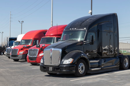 Indianapolis - Circa March 2023: Used Kenworth, International and Freightliner trucks for sale. Pre-owned semi tractor trailer trucks are in high demand.のeditorial素材