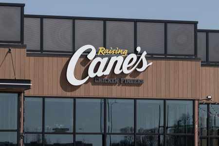Noblesville - Circa March 2023: Raising Cane's Chicken Fingers restaurant. Raising Cane's was founded in Baton Rouge.のeditorial素材