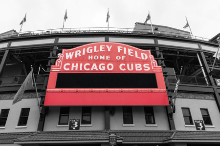 Chicago - Circa April 2023: Wrigley Field Home of Chicago Cubs in red with copy space. Wrigley Field has been home to the Cubs since 1916.のeditorial素材