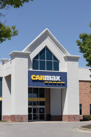 Indianapolis - Circa May 2023: CarMax Auto Dealership. CarMax is the largest used and pre-owned car...