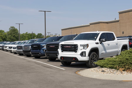 Carmel - June 10, 2023: Used GMC Truck and SUV display. With current supply issues, GMC is buying and selling many pre-owned cars to meet demand.のeditorial素材