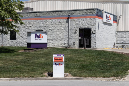 Kokomo - July 14, 2023: Federal Express Ship Center. FedEx is a global courier delivery services...