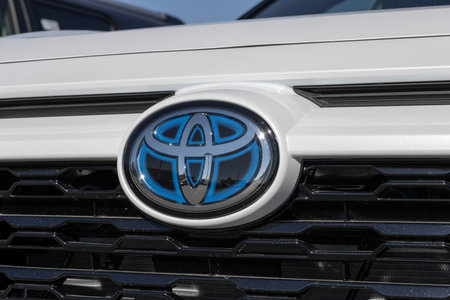 Avon - November 5, 2023: Toyota RAV4 Hybrid display at a dealership. Toyota offers the RAV4 in LE,...