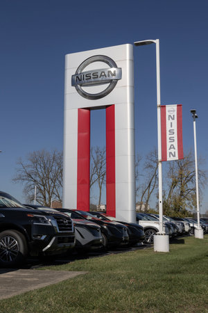 Indianapolis - November 19, 2023: Nissan Car, SUV and Pickup Truck dealership. Nissan manufactures the Sentra, Altima and Versa.のeditorial素材
