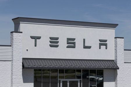 Moraine - May 31, 2024: Tesla EV electric vehicle Service Center. Tesla models include the Model 3,...