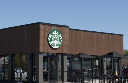 Indianapolis - September 1, 2024: Starbucks coffeehouse chain. Starbucks has coffee locations in over 80 countries.のeditorial素材