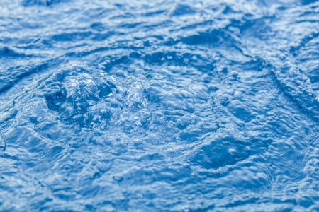 swimming pool moving water surfaceの写真素材