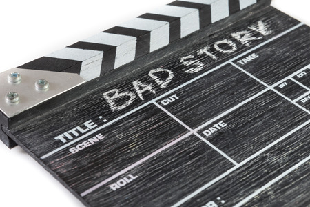 wooden clapper board on white background Title Bad storyの写真素材