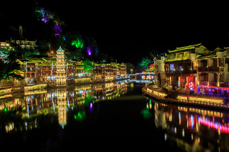 night scene of Fenghuang (Phoenix) ancient town Hunan Chinaの写真素材
