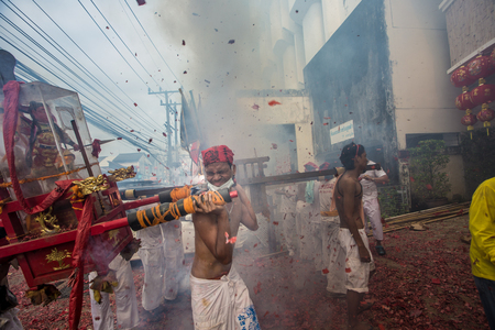 PHUKET, THAILAND - October18: Street procession around Phuket town in 2015 Phuket Vegetarian Festival  on October 18, 2015 in Phuket, Thailand, Street procession is the most spectacular event in festivalのeditorial素材