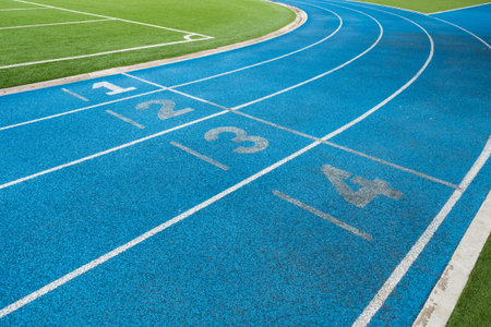 blue running athletics track