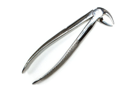 Used real dental forceps from equipment tools. Isolated on white background