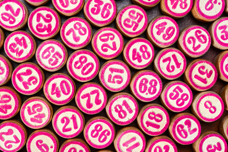 Board game lotto or bingo. Wooden lotto barrels with numbers. Vintage Gameの写真素材