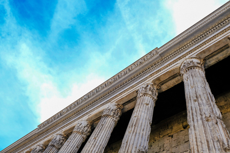 View of Colonnade of the Pantheon against the blue sky. Ruins of Ancient Rome, Italy.の写真素材