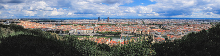 Panoramic view of Lyon on the riverside of Rhone river from top of Fourviere Hill. Beautiful cityscape in sunny summer day.の写真素材