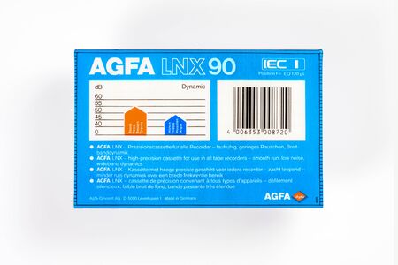 BREMEN, GERMANY - MAY 29, 2019: Sealed audio compact cassette AGFA Ferro LNX 90 blue. Rare viantage audio cassette, back close-up view on white background.のeditorial素材