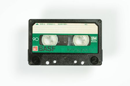BREMEN, GERMANY - MAY 29, 2019: Audio compact cassette BASF LH Super I 90 green. Rare viantage audio cassette, close-up view on white background.のeditorial素材