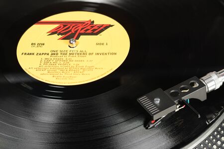 LONDON, ENGLAND - MAY 08, 2019: Vintage vinyl record with Discreet label played on the turntable with audiophile Ortofon cartridge.のeditorial素材