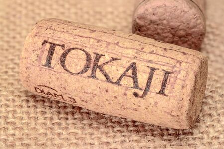 TOKAI, HUNGARY - FEBRUARY 07, 2019: Wine cork of Tokaji wine on burlap background. Hungaryのeditorial素材