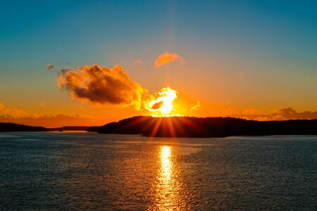 Magnificent sunset over Aland skerries in Baltic sea in Finland.の写真素材