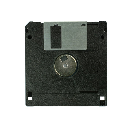 Floppy disk 3.5 inch isolated on white backround. Vintage computer diskette, top back view macro...