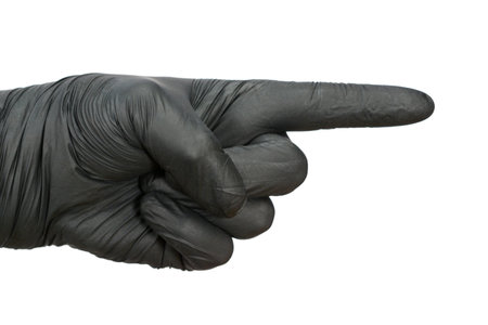 Hand in black rubber glove pointing to right with index finger. Isolated on white background.