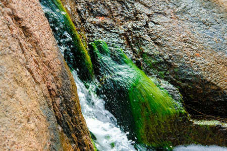 Small stream in northern rocks, Sapokka landscape park, Kotka, Finland.