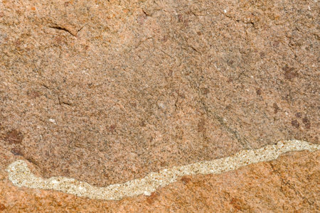 Old medieval stone wall background and texture, close up.