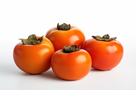 Ripe persimmon fruit isolated on white background with copy spaceの素材