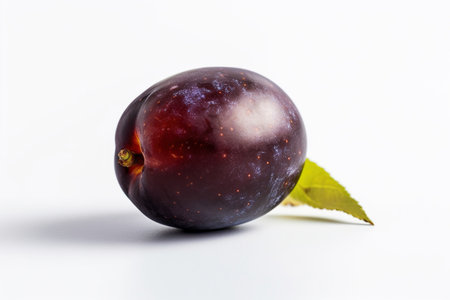 Ripe plums on a white background, close-up.の素材