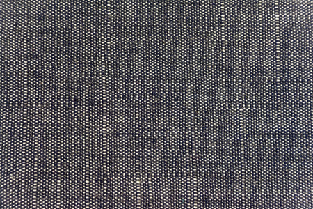Fabric showing woven pattern with blue and white threadの写真素材