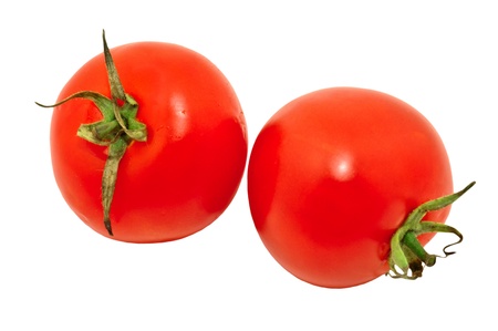 Closeup image of two red tomatoes, isolated on white backgroundの写真素材