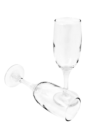 Closeup of two empty glasses for champagne. Isolated on white backgroundの写真素材