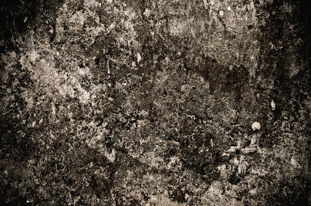 Abstract background: dark grunge texture on the wallの写真素材