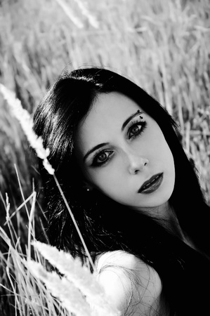Closeup portrait of a beautiful young girl. Black and whiteの写真素材