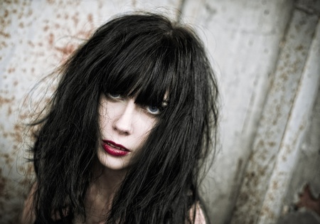 Closeup portrait of beautiful bad goth girl styleの写真素材