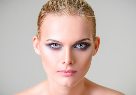 Studio beauty shot: closeup portrait of a beautiful young womanの写真素材