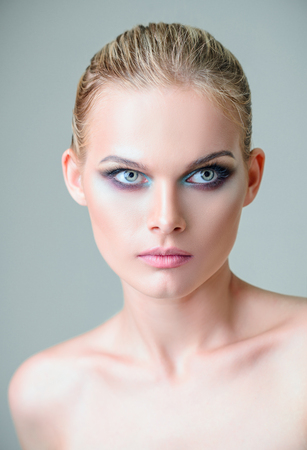 Studio beauty shot: closeup portrait of a lovely young girlの写真素材
