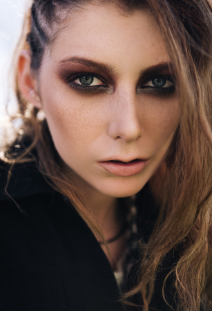 Close-up portrait of the pretty grunge (rock) girlの写真素材