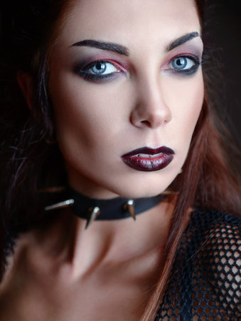 Close-up portrait of the beautiful young goth girl. dark beautyの写真素材