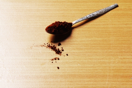 Coffee powder stained on the wood table の写真素材